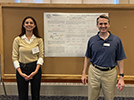 Michelle and Scott at the undergraduate research poster session, August 2023